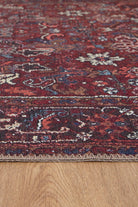 Parisa Red Persian Area Rug on floor facing