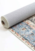 Load image into Gallery viewer, Distressed Vintage Cezanne Terracotta Sky Area Rug folded
