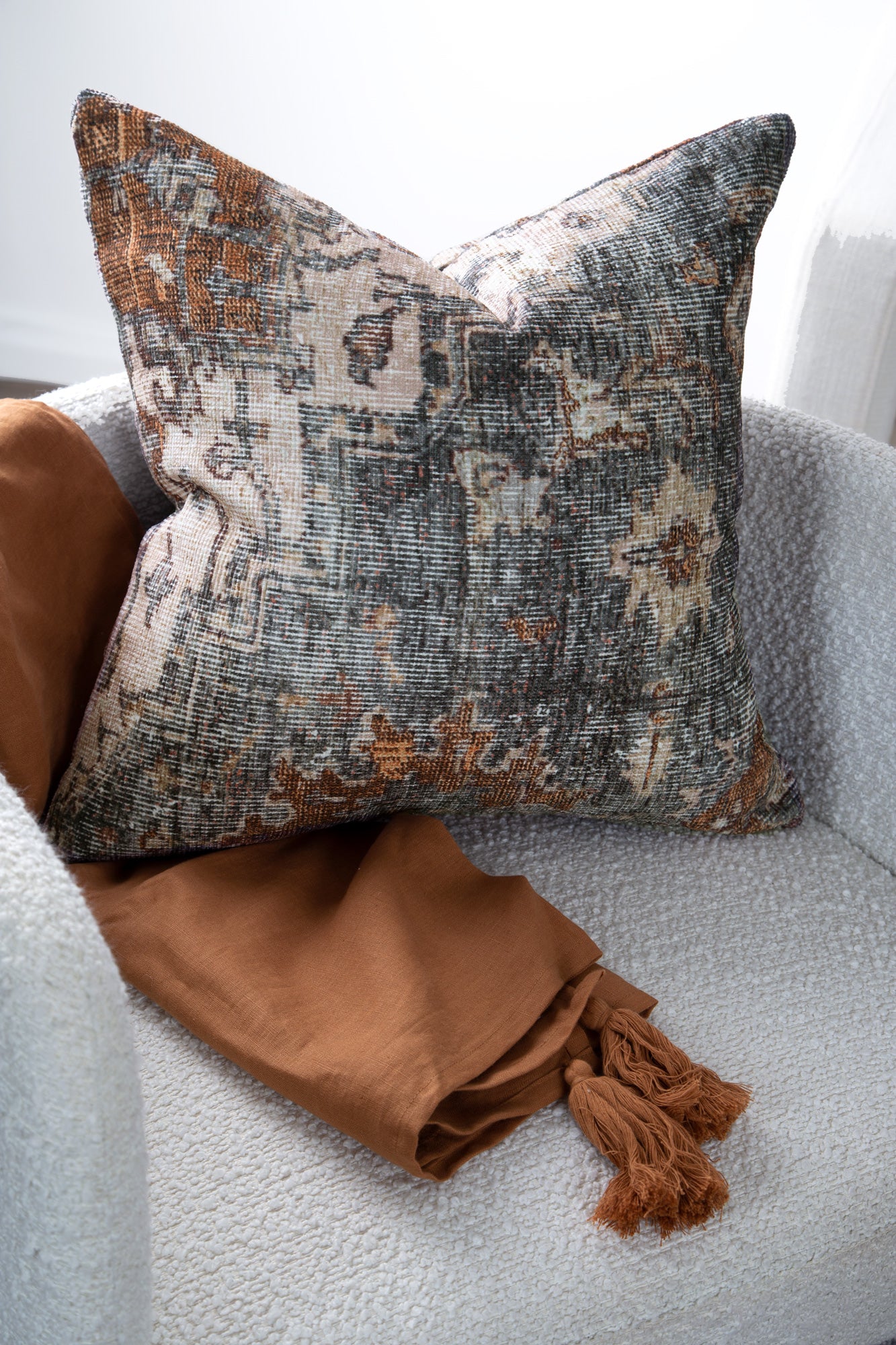 Distressed Vintage Cezanne Rabbit Gray Inca Gold Pillow on sofa