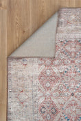 Load image into Gallery viewer, Distressed Vintage Levent Area Rug folded
